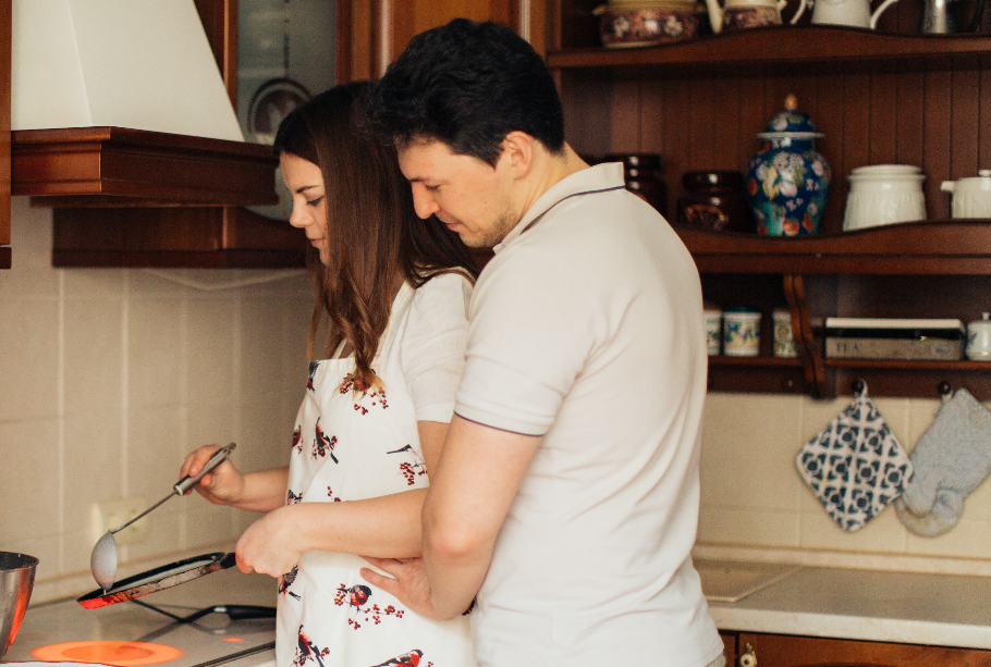 couple cooking on the kitchen